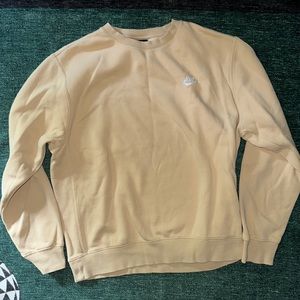 Nike crewneck, pale yellow color, size medium